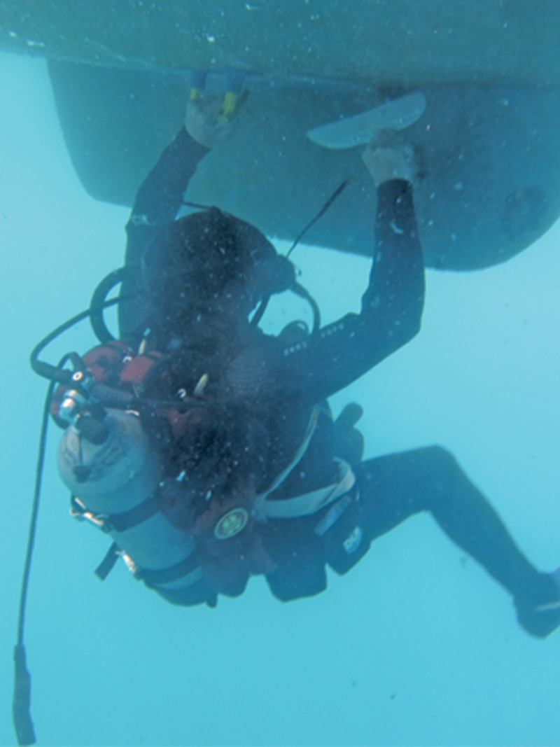 Diver working on hull